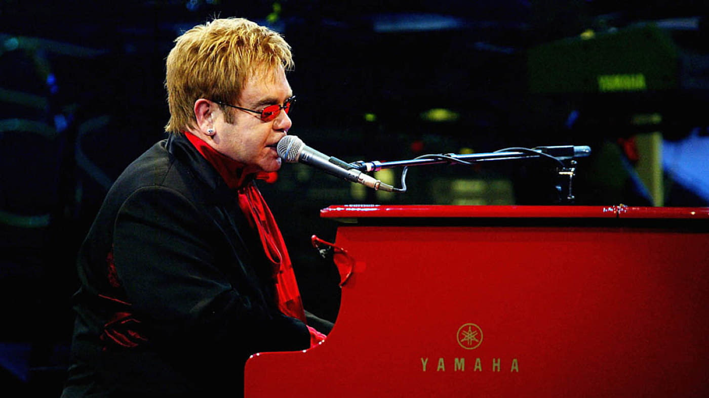 Elton John: The Red Piano Background